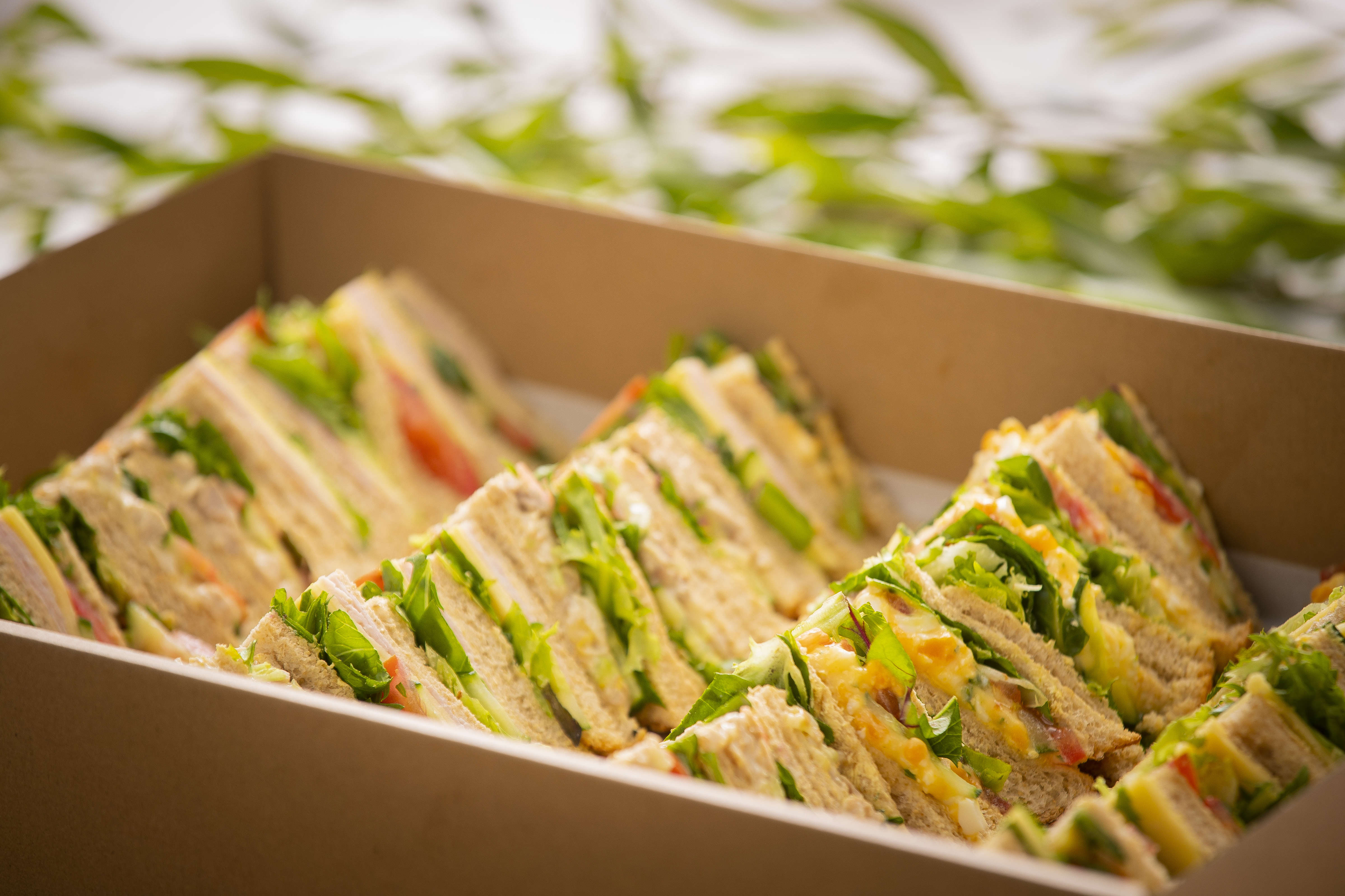 Mixed sandwich catering box containing 40 triangles, fillings include free range ham, vegetarian, free range chicken, egg and cheese all with assorted salad. Photo: Richard Jupe.