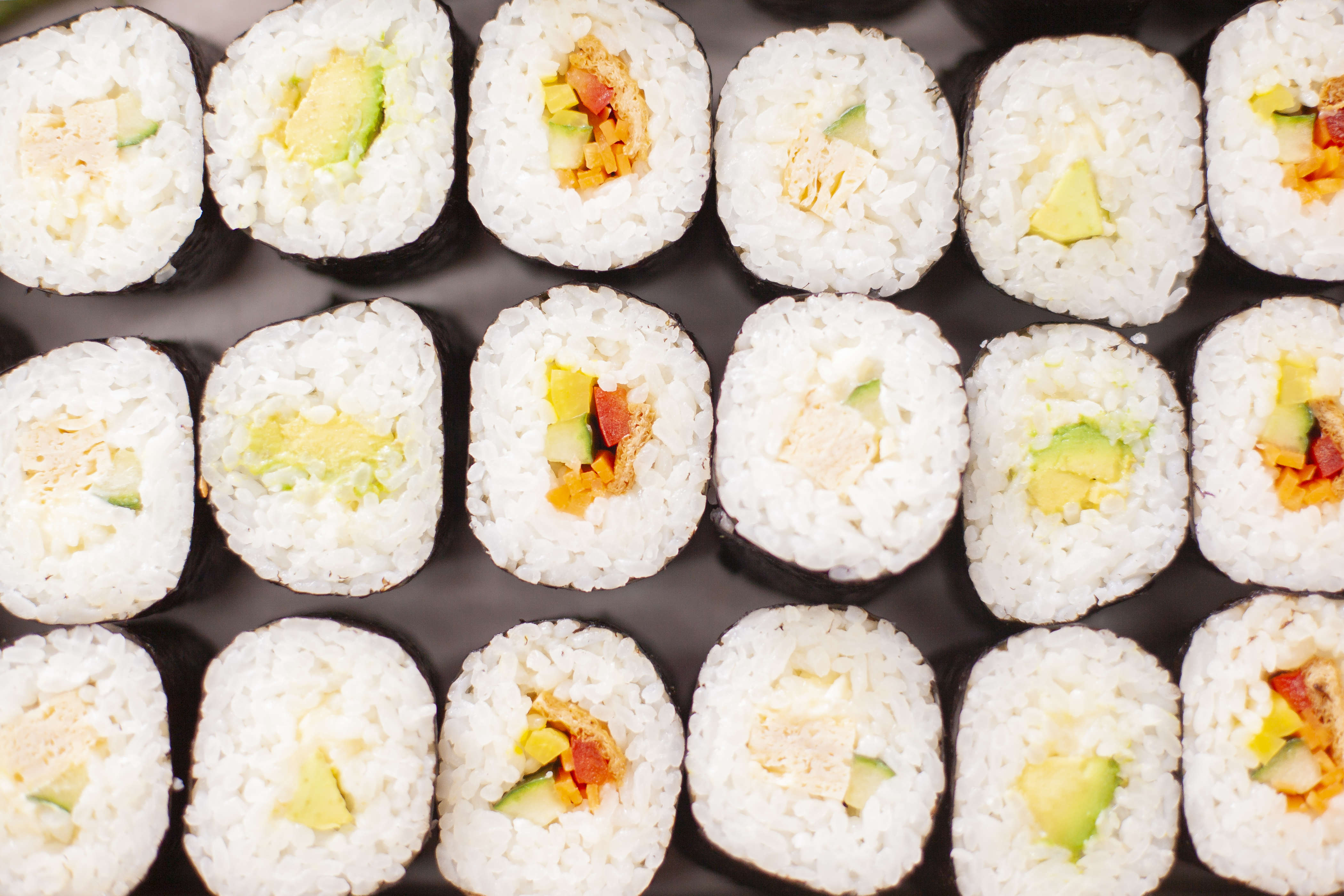 Flat lay photo of sushi box showing vegan and vegetarian fillings. Photo: Richard Jupe.